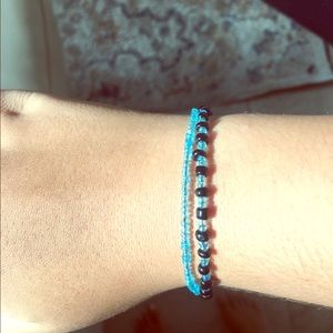 Paired blue and black bracelet